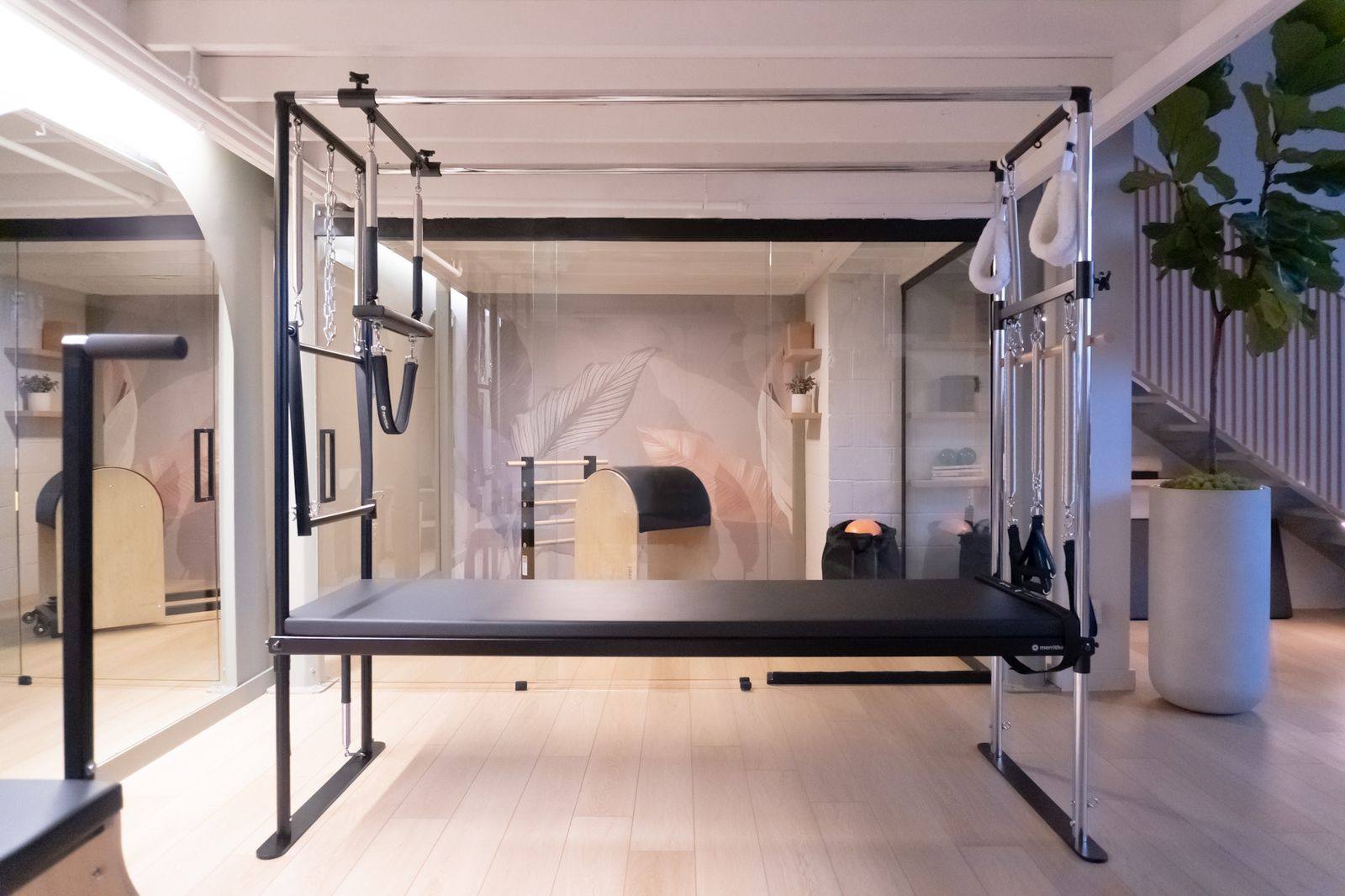 The Cadillac trapeze table framed by arches at Leaside Pilates